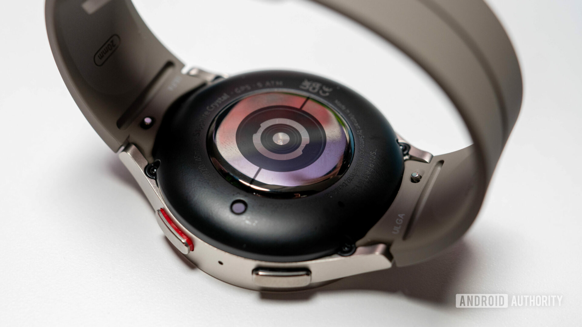 Samsung Galaxy Watch 5 Pro in silver color with fluoroelastomer strap showing rear sensor and buttons