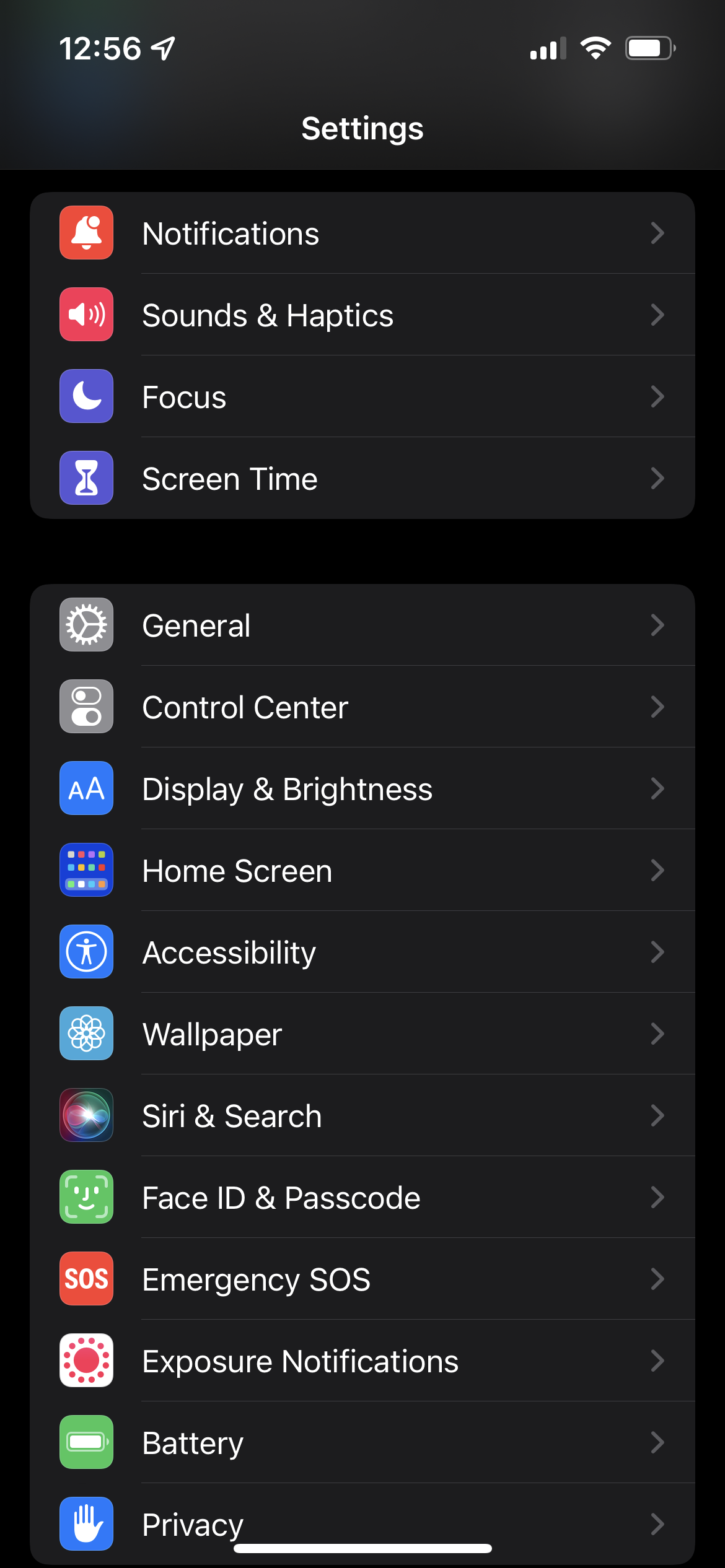 The General menu highlighted in iOS 15 Settings