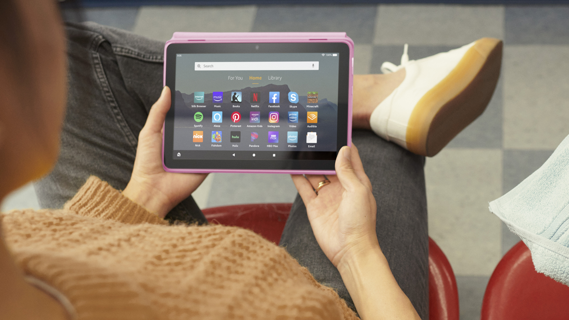 Amazon Fire HD 8 2022 in persons lap