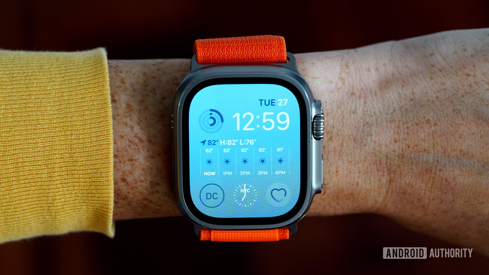 An Apple Watch Ultra displays the Modular watch face on a user's wrist