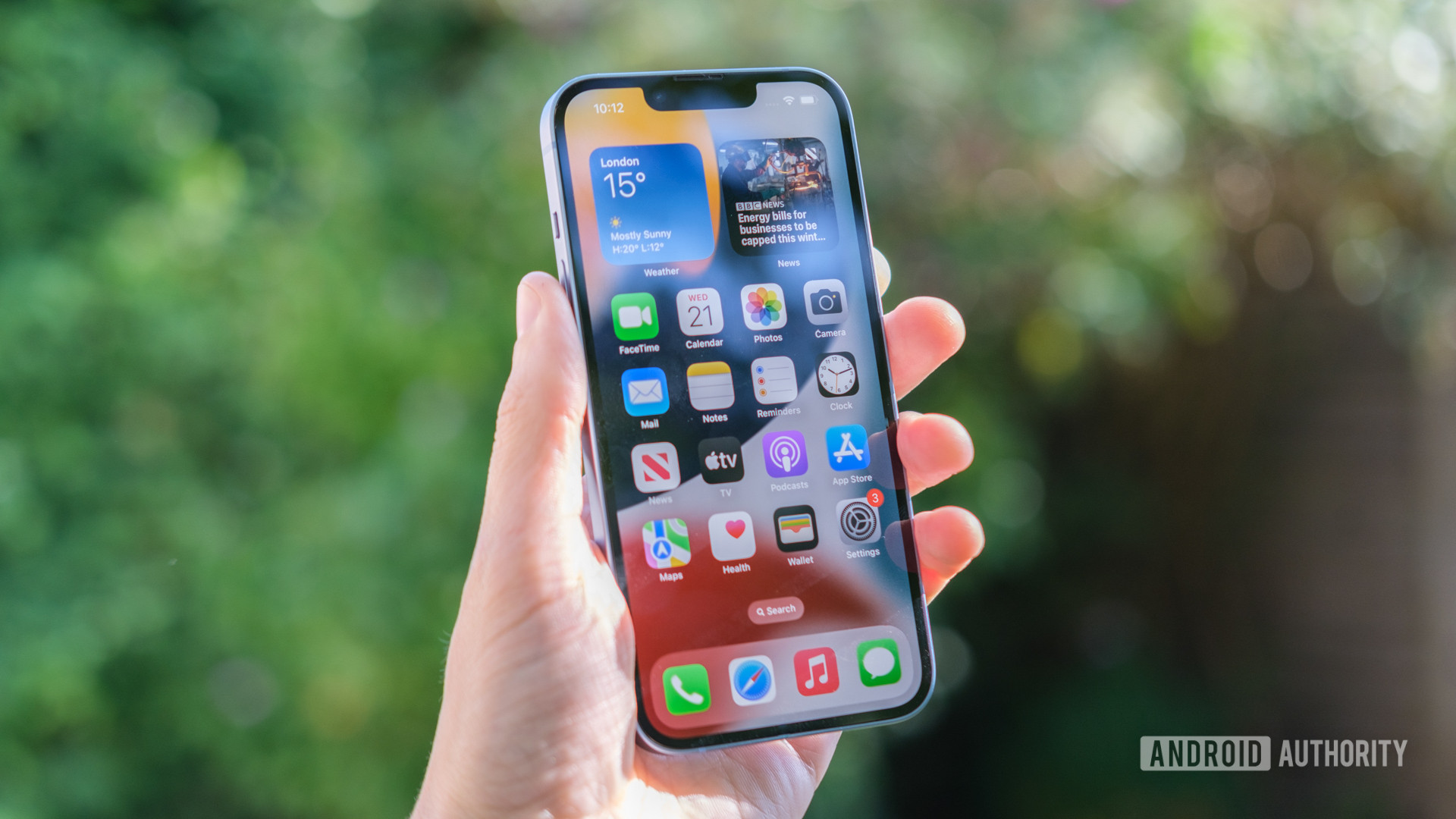 Apple iPhone 14 homescreen in hand 1 - The best phones for seniors