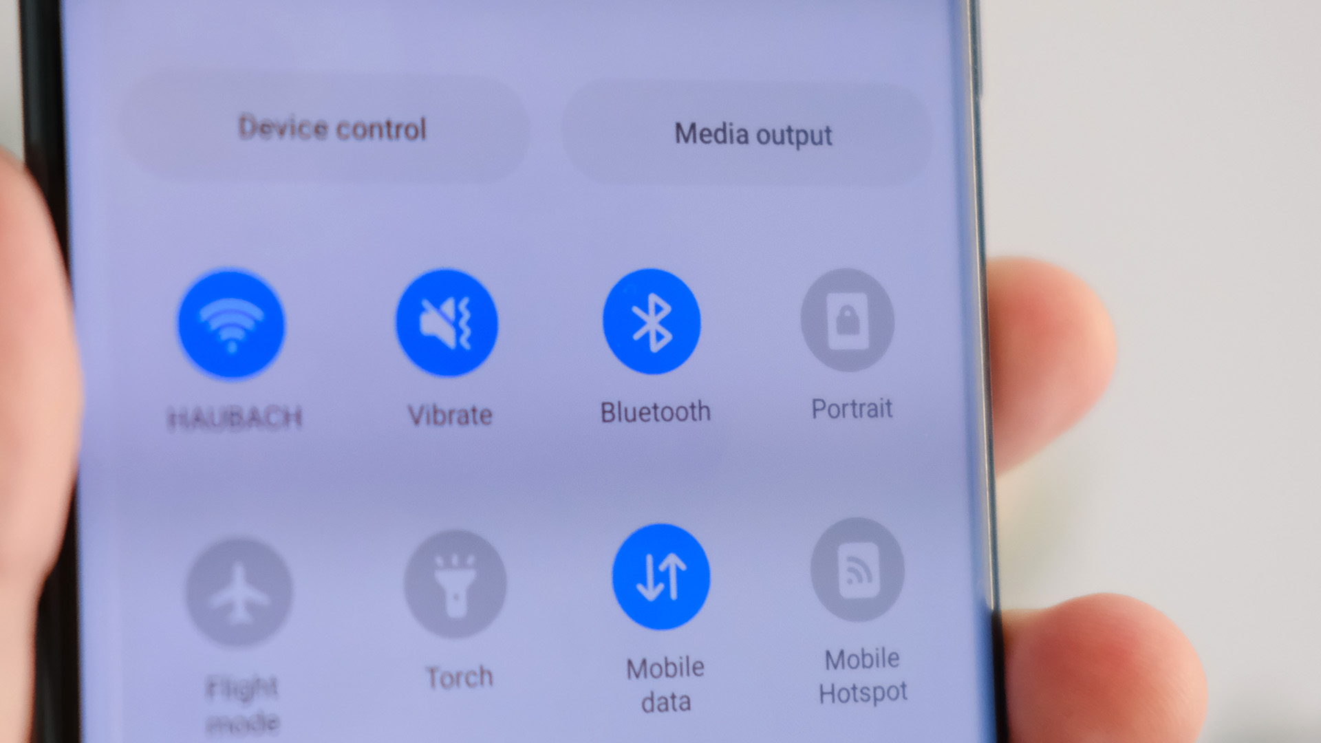 A Bluetooth icon shown on the screen of smartphone in its settings menu.