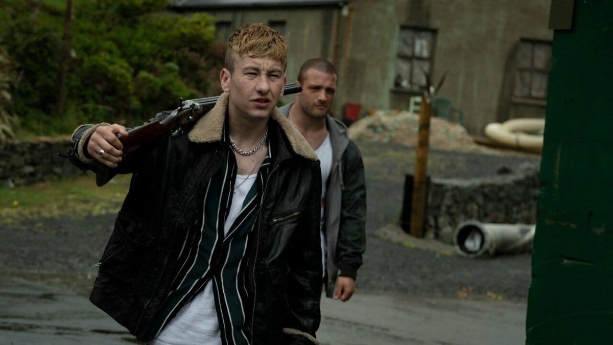  Cosmo Jarvis and Barry Keoghan carrying guns in Calm with Horses