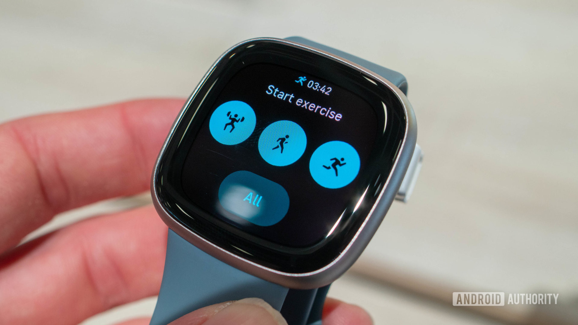 A user reviews the activities on the Fitbit Versa 4.