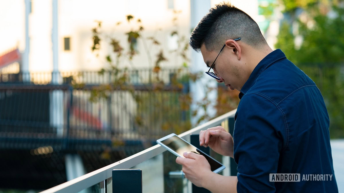 Samsung Galaxy Tab A7 Lite being used outdoors