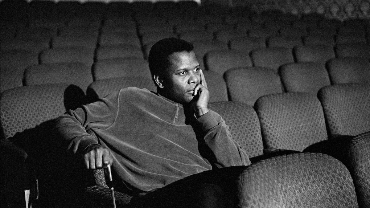 Sidney Poitier sits in a movie theater - best new streaming movies
