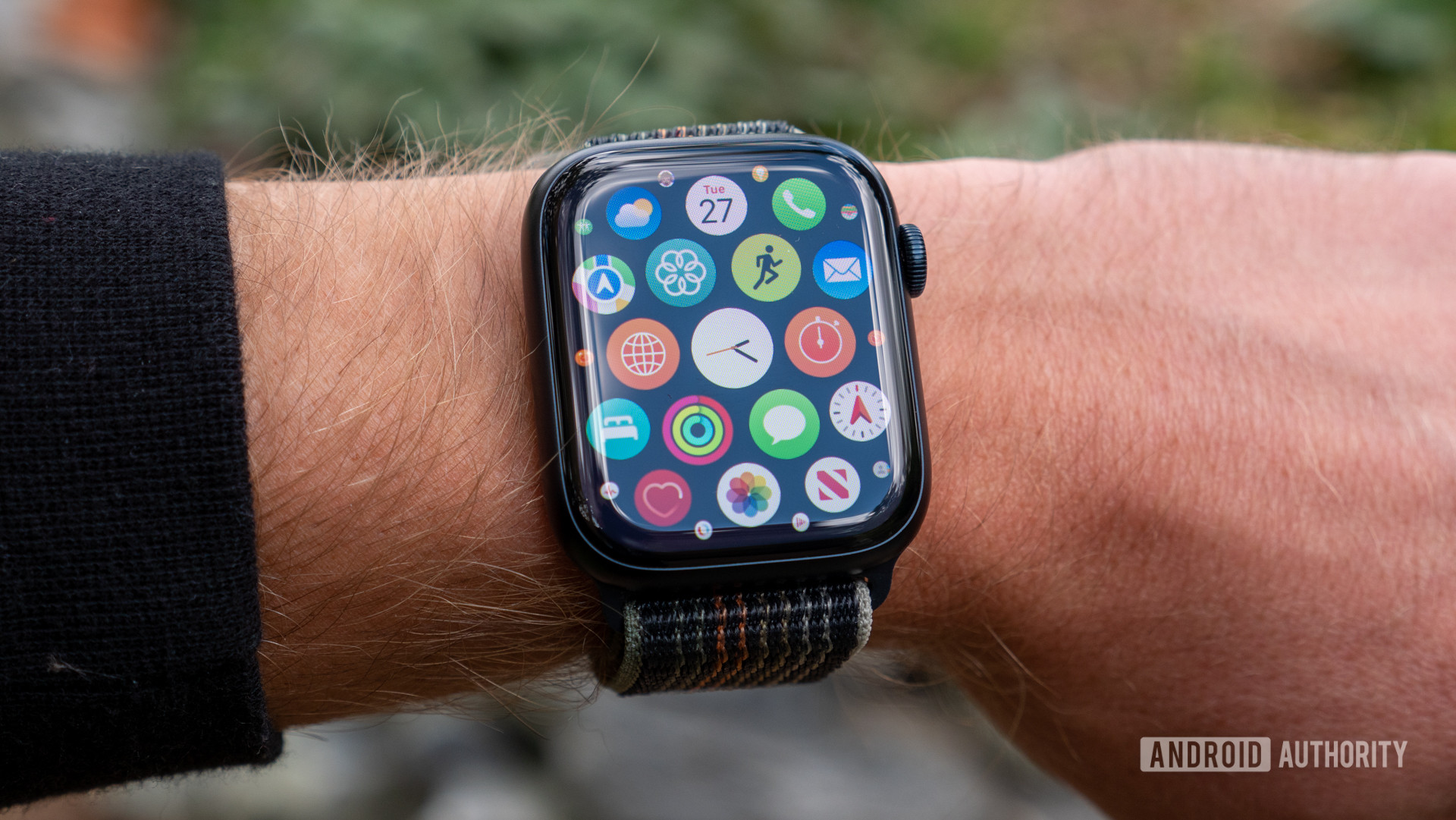 An Apple Watch Series 8 on a user's wrist display their App Library.