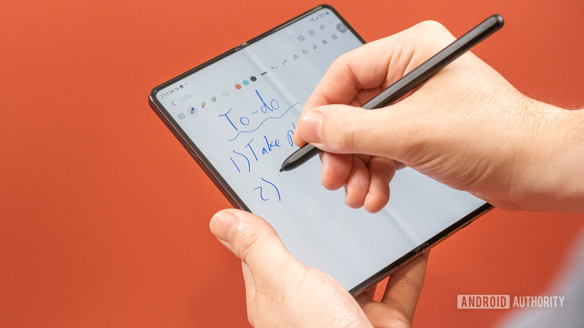 Holding the Galaxy Z Fold 4 and taking notes with the S Pen