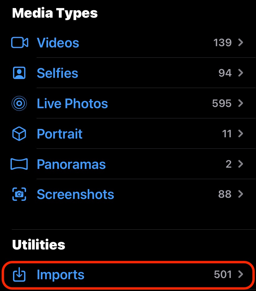 The iOS Photos app imports downloaded files