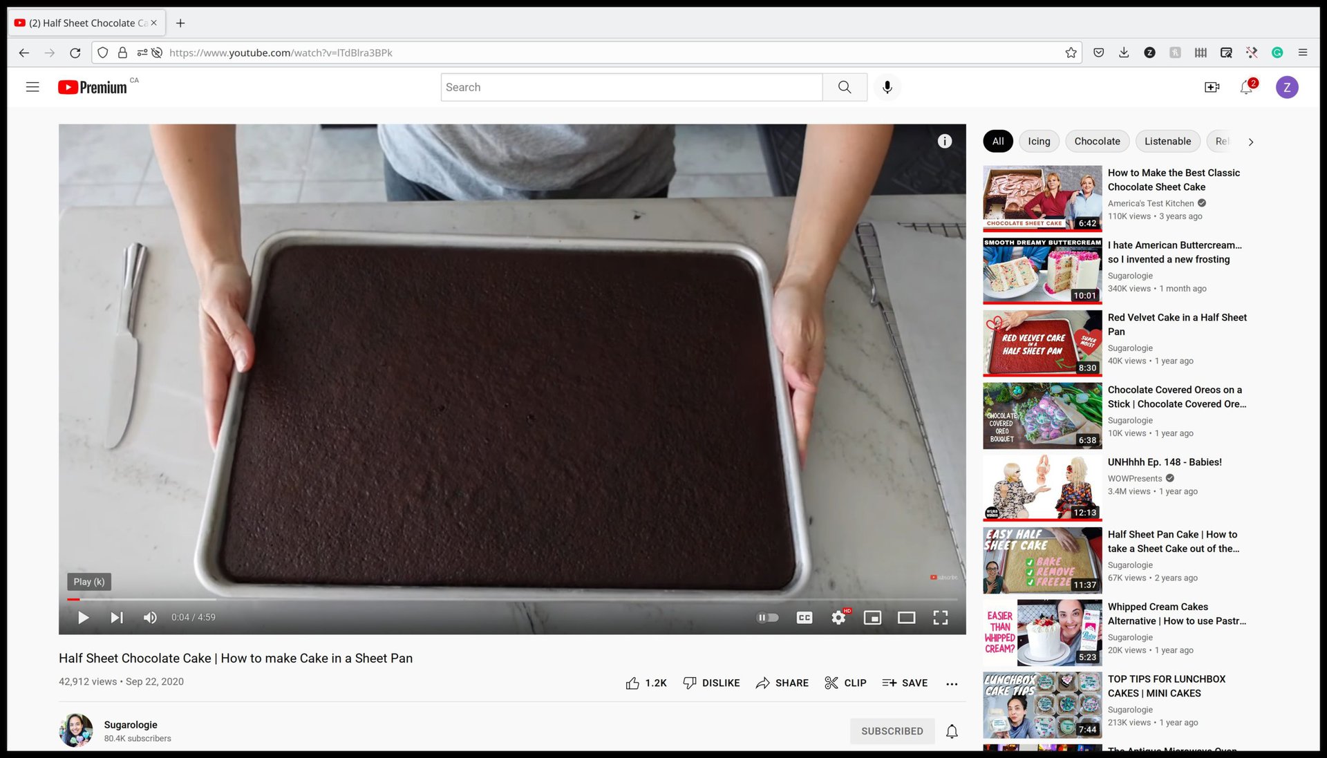 A screenshot of a YouTube video about baking a chocolate cake from Sugarologie with the &quot;Clip&quot; button visible.