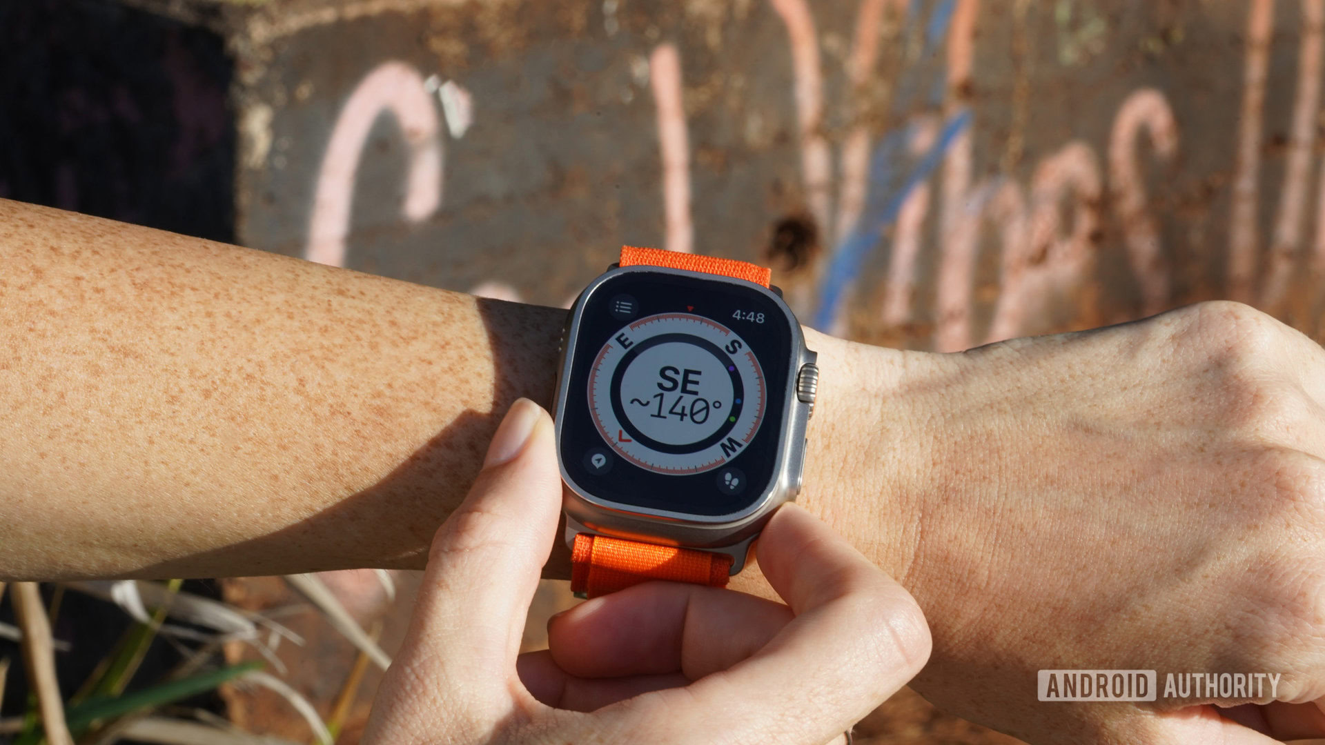 A user checks the compass on their Apple Watch Ultra.