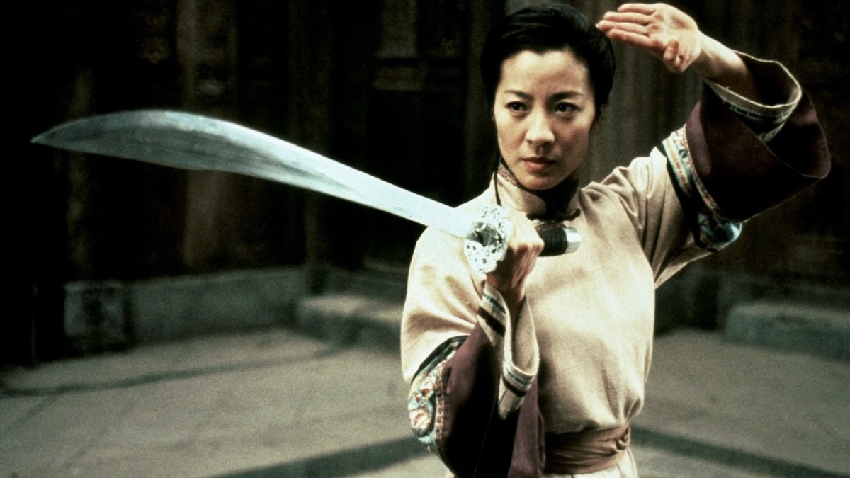 Michelle Yeoh holds a sword in Crouching Tiger Hidden Dragon - best action movies on amazon prime video