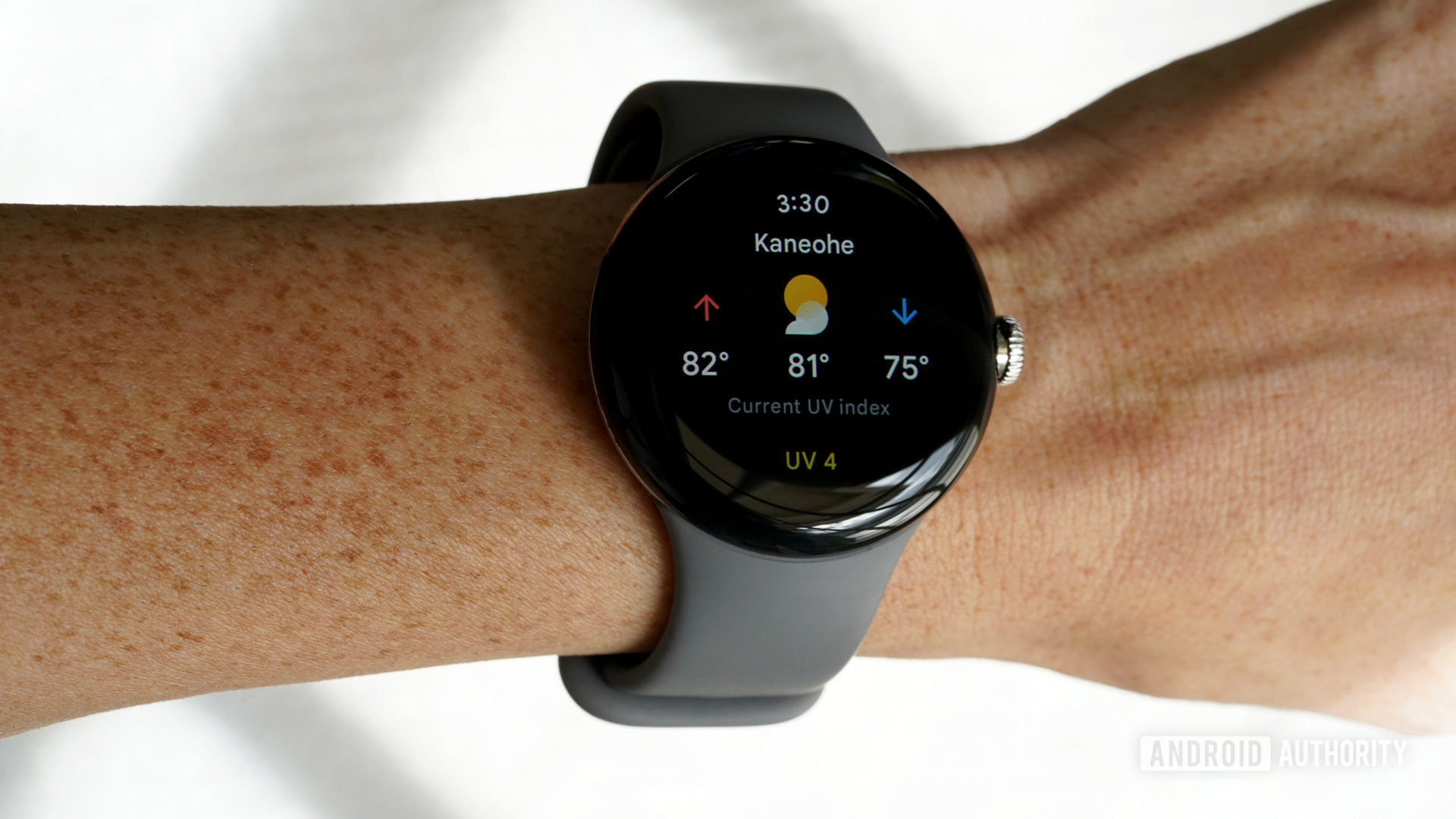 A user checks the weather on their Google Pixel Watch including the UV index.