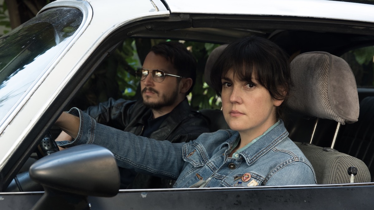 A man and woman sit in a car in I Don't Feel at Home in This World Anymore