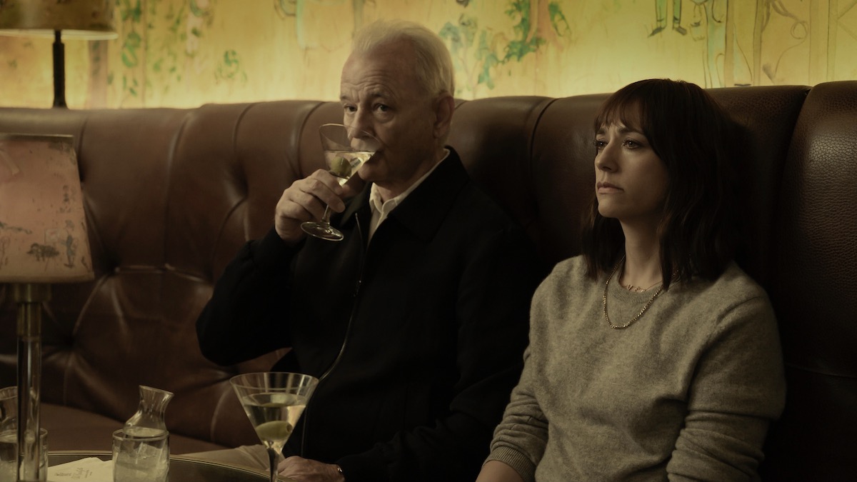 Bill Murray and Rashida Jones sit in a restaurant booth in On the Rocks - best movies on Apple TV Plus