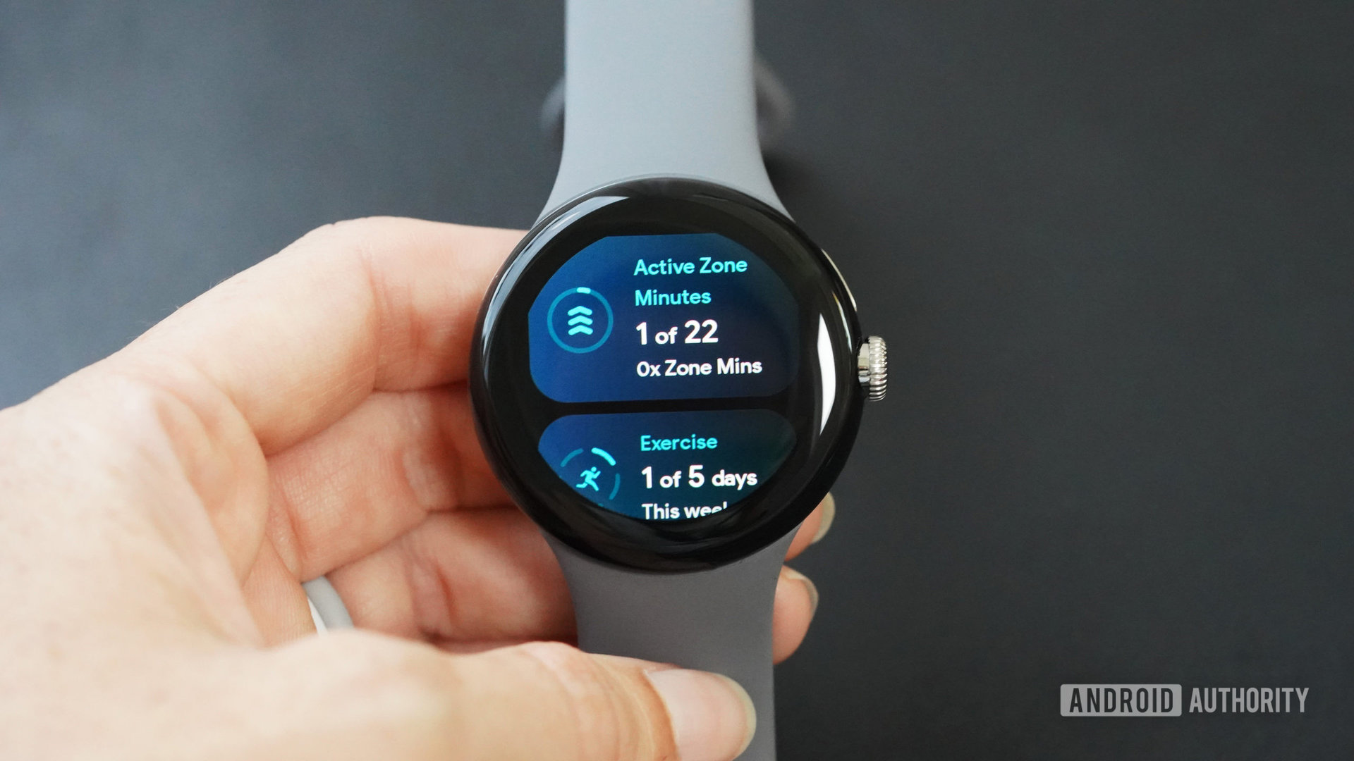 A Google Pixel Watch displays a user's Fitbit Active Zone Minutes.