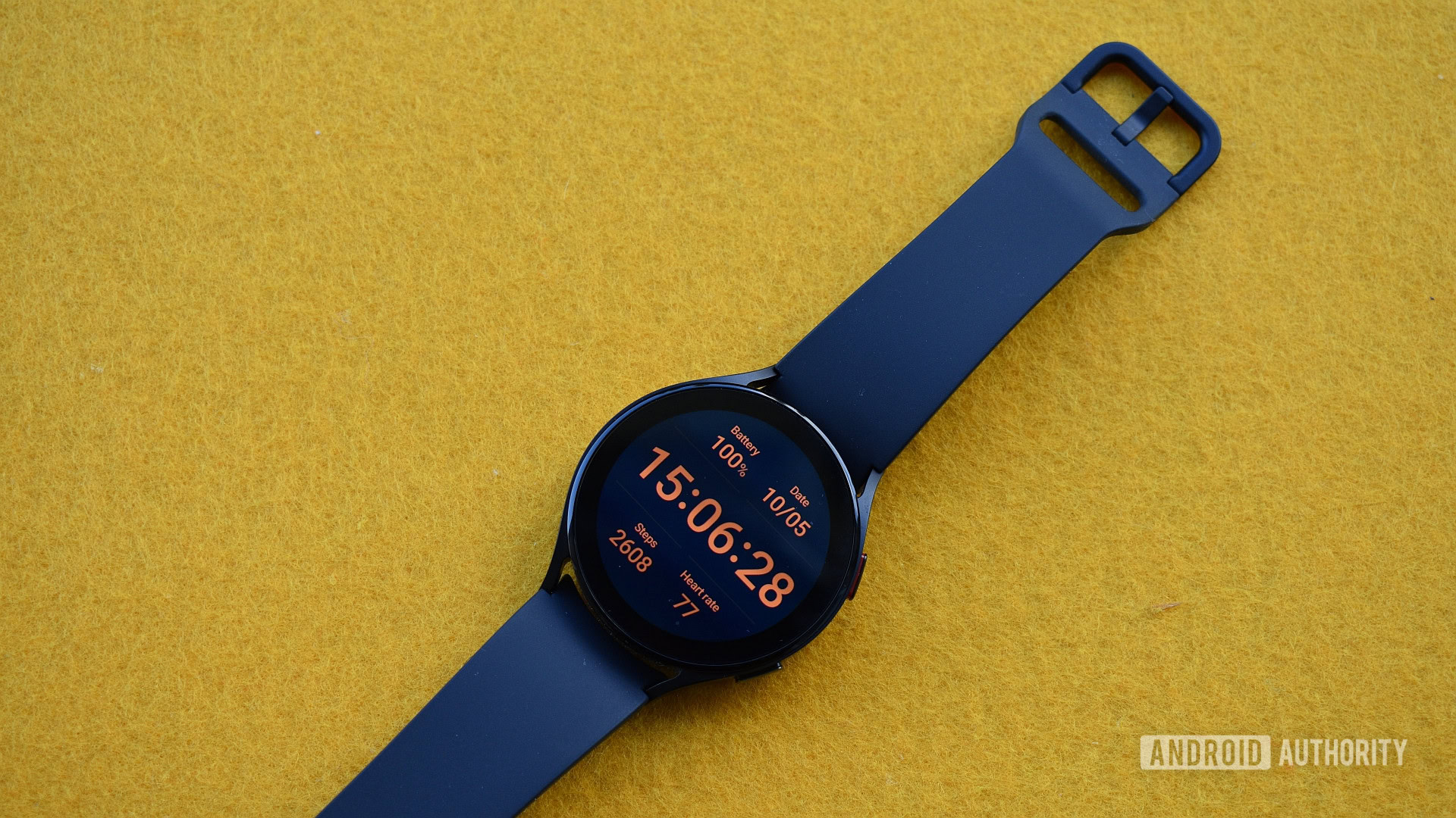 Samsung Galaxy Watch 5 watch face on yellow table