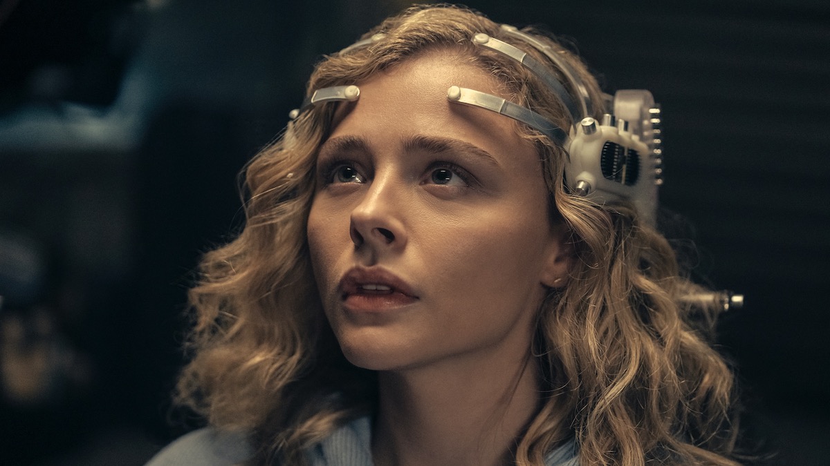 Chloë Grace Moretz wearing a sci-fi headpiece in The Peripheral - popular streaming shows