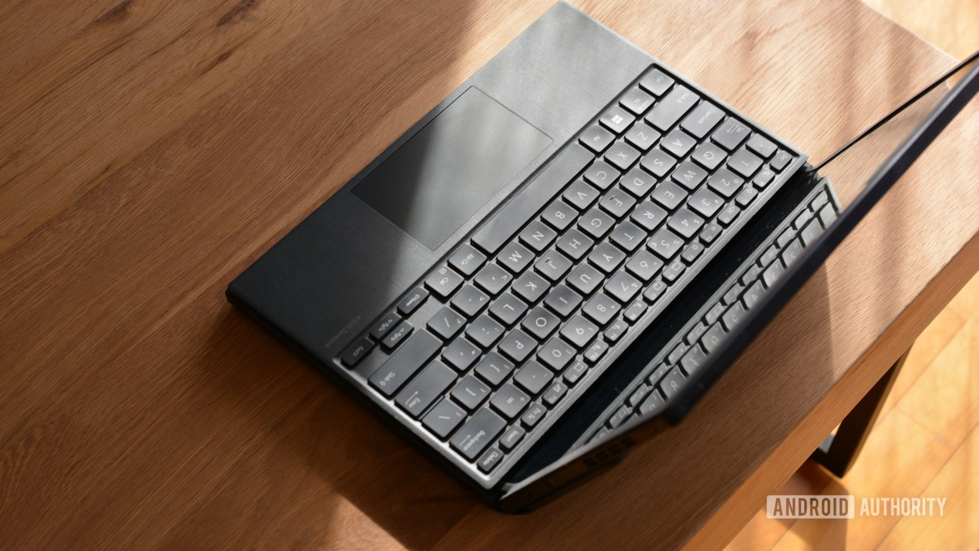 asus zenbook 17 layar lipat tampilan atas laptop dengan keyboard di 9