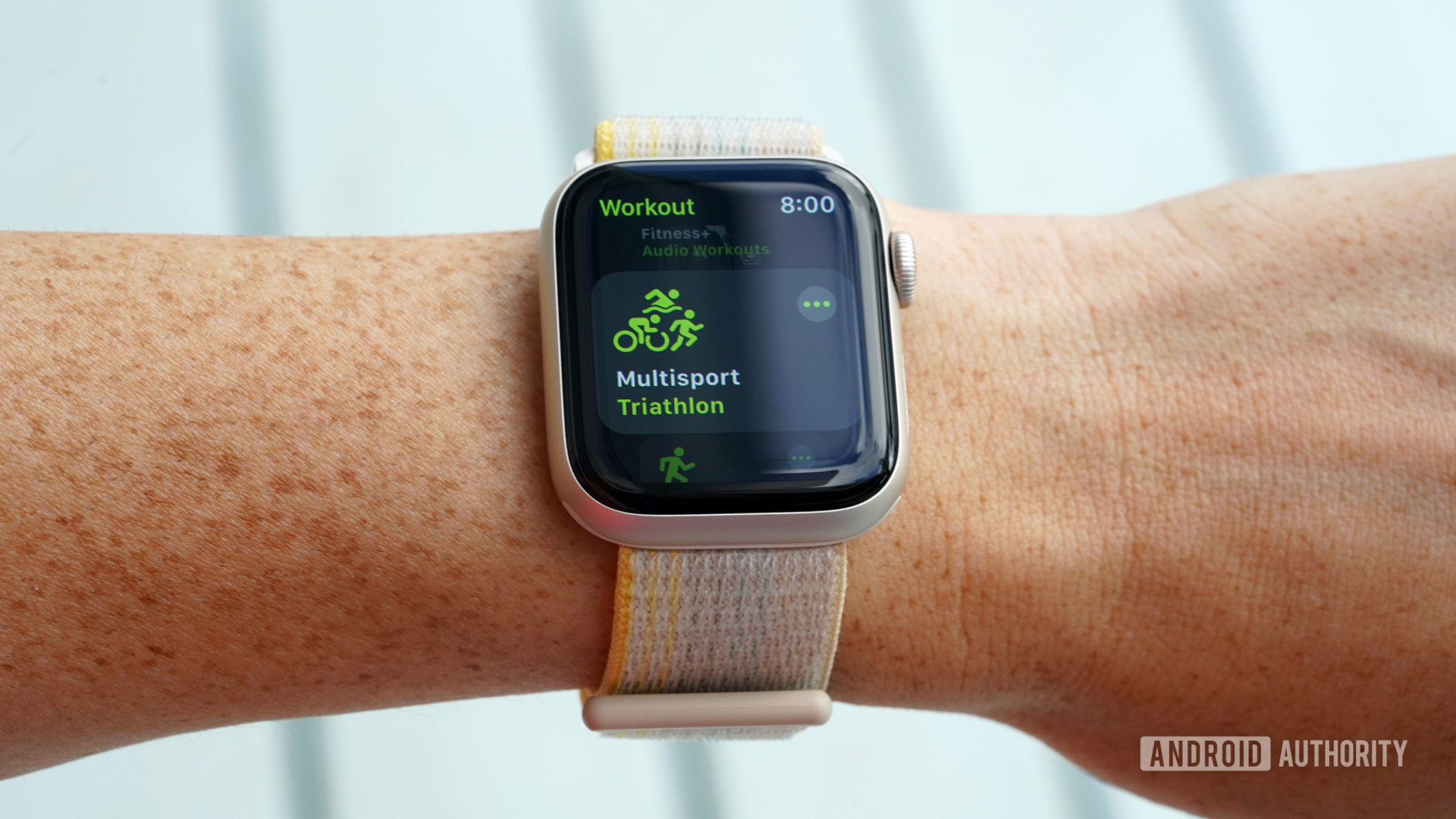 An Apple Watch SE 2 on a user's wrist display the Multisport workout mode.