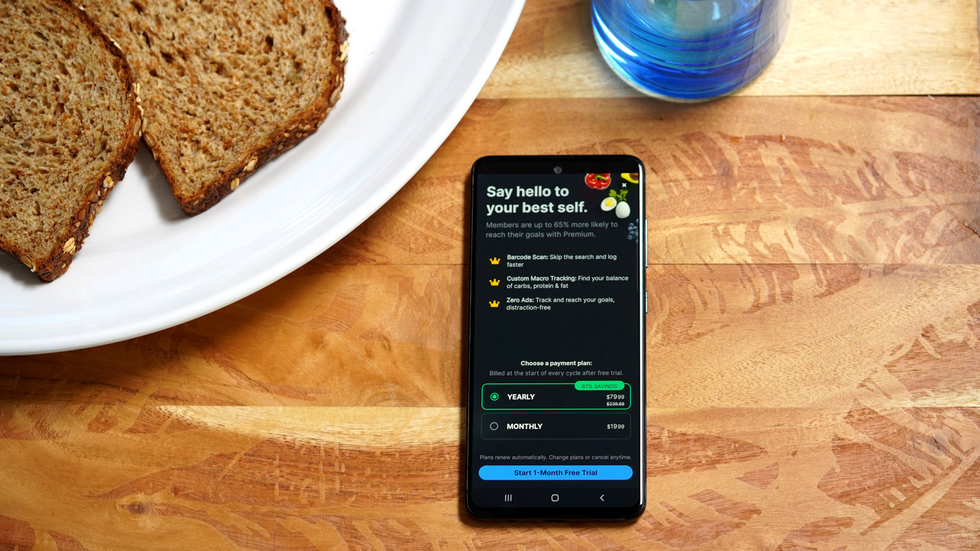 A Galaxy A51 displays the sign up screen for MyFitnessPal Premium.