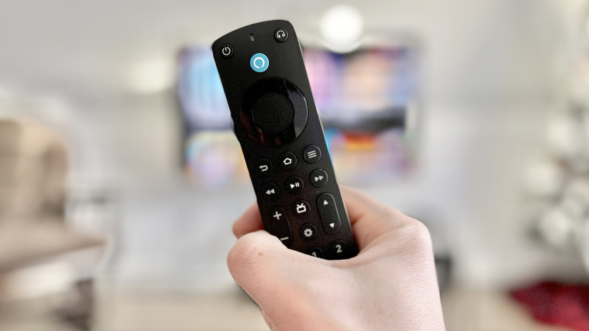 The Alexa Voice Remote Pro in hand