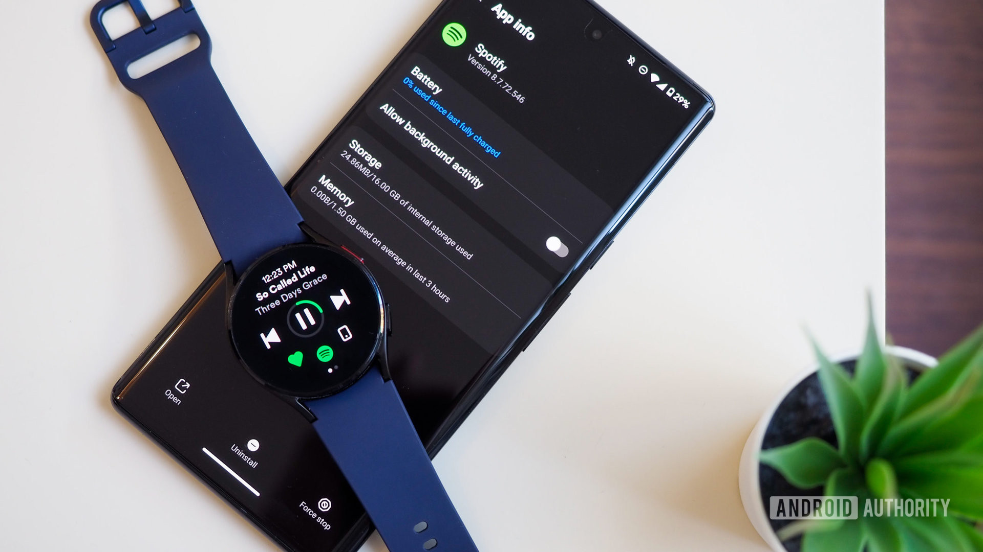 Galaxy Watch 4 and Galaxy Wearable app on a Pixel 6 Pro showing Spotify app info and management