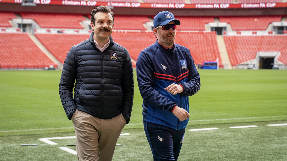 Ted and Coach Beard on the pitch in Ted Lasso