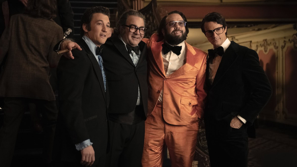 Miles Teller as Al Ruddy, Patrick Gallo as Mario Puzo, Dan Fogler as Francis Ford Coppola and Matthew Goode as Bob Evans in The Offer