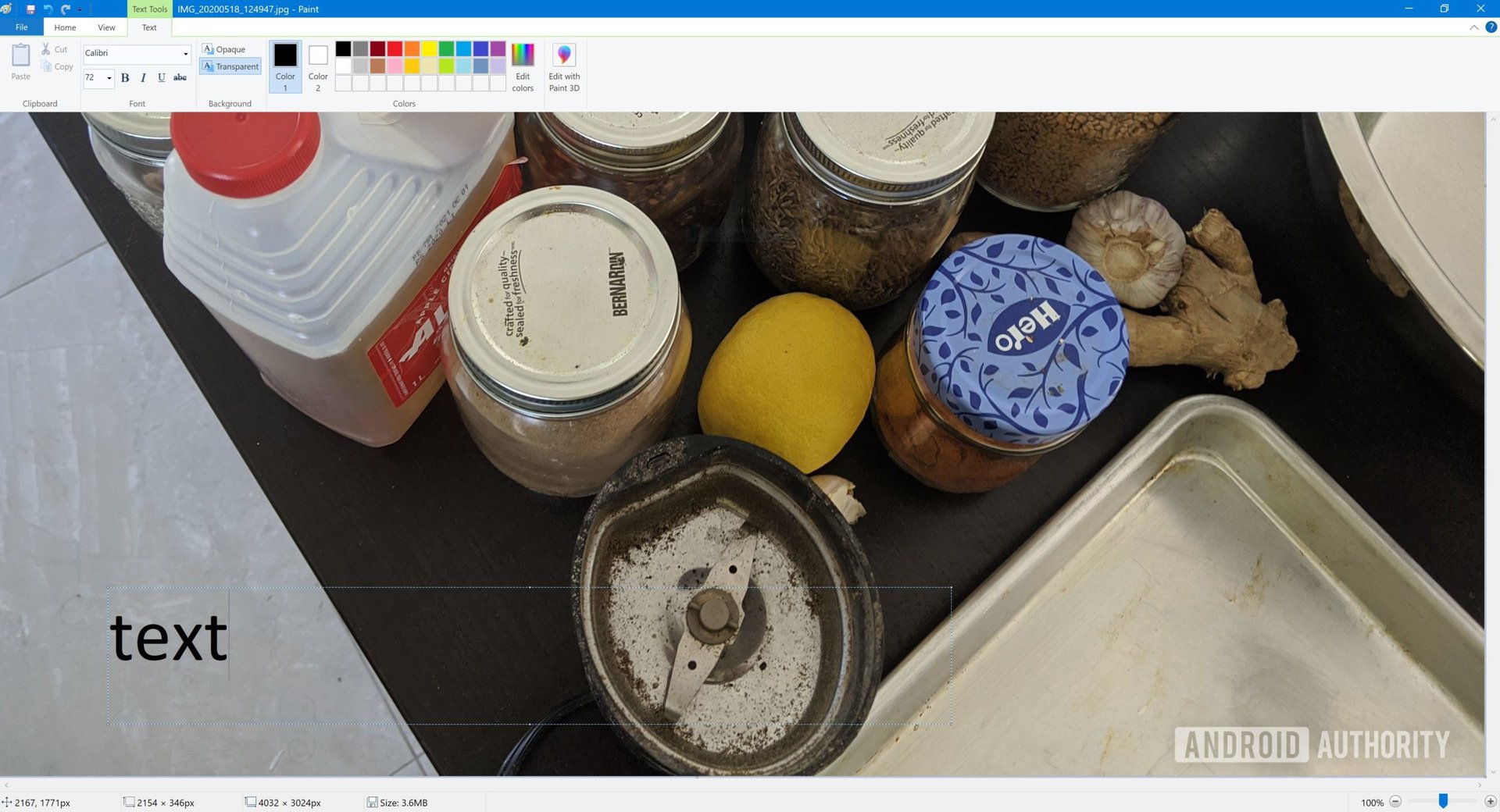 A screenshot of the Paint app in windows showing a text box inserted on an image.