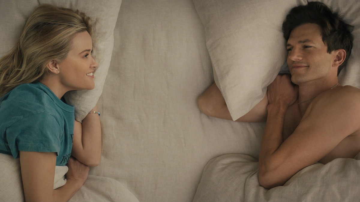 Reese Witherspoon and Ashton Kutcher share a bed in Your Place or Mine - best romance movies on netflix