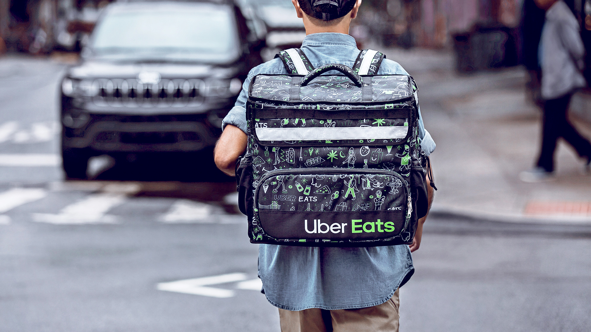 An Uber Eats courier on foot