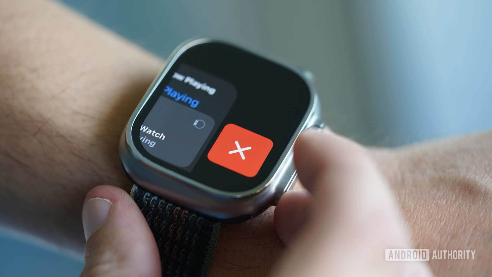 A user closes an app on their Apple Watch Ultra.