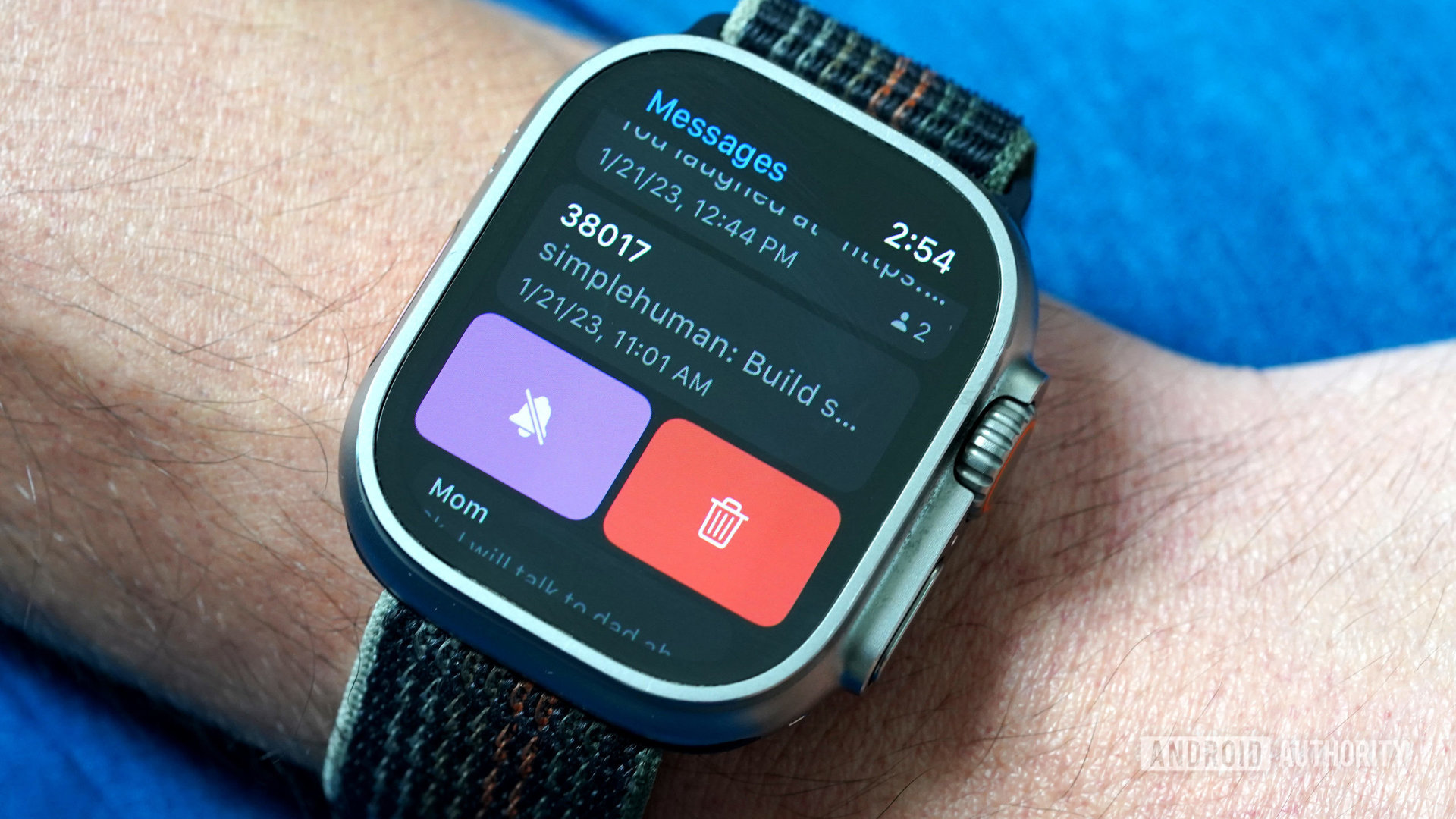 A user deletes messages from their Apple Watch Ultra.