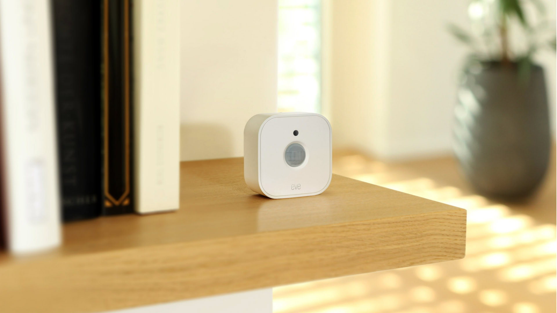 The Eve Motion sensor on a shelf