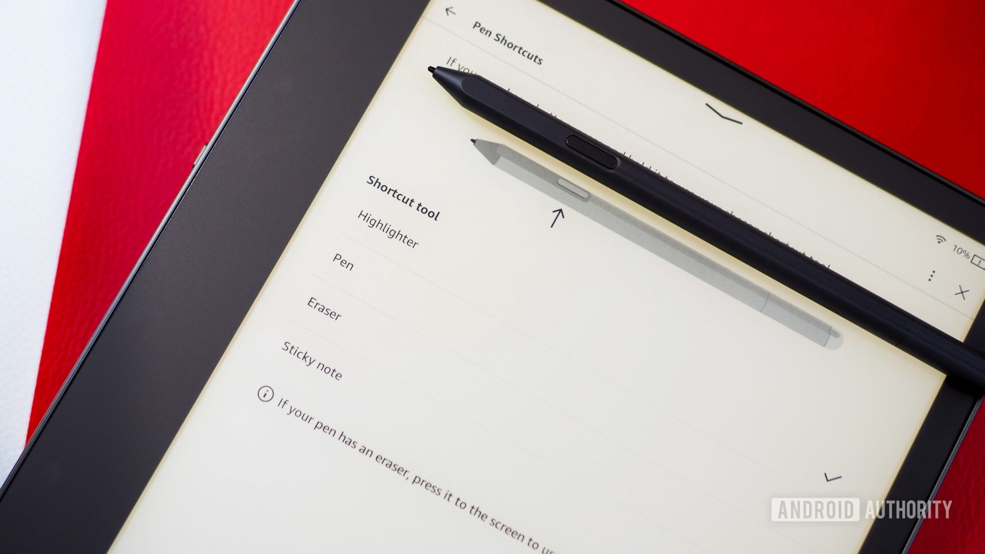 Premium Pen resting on the Amazon Kindle Scribe which is showing the side button's different settings options