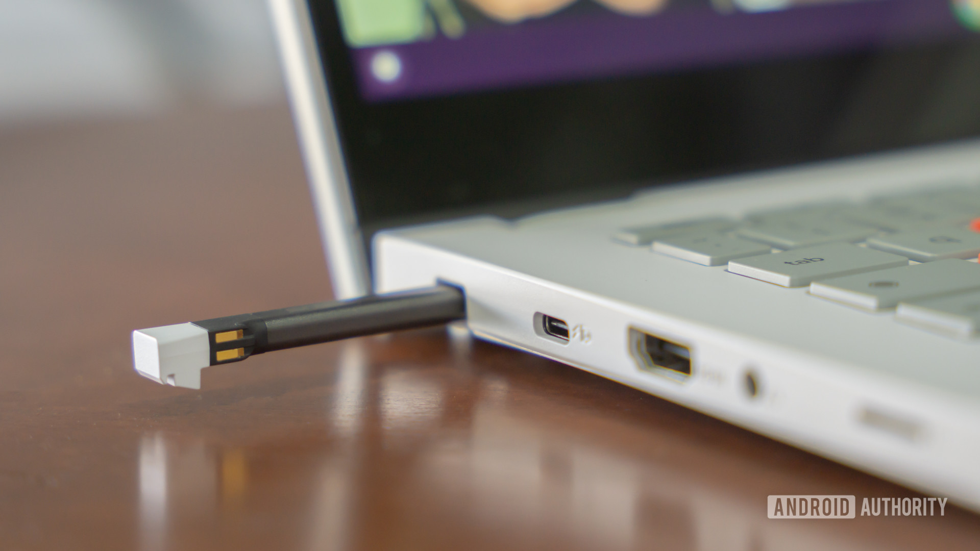 ASUS Chromebook Vibe CX34 Flip stylus coming off its housing