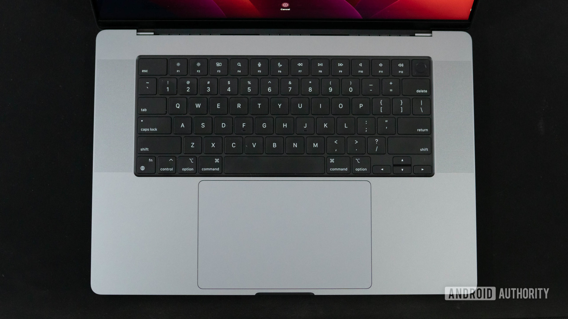Apple MacBook Pro 2023 keyboard top down view and trackpad