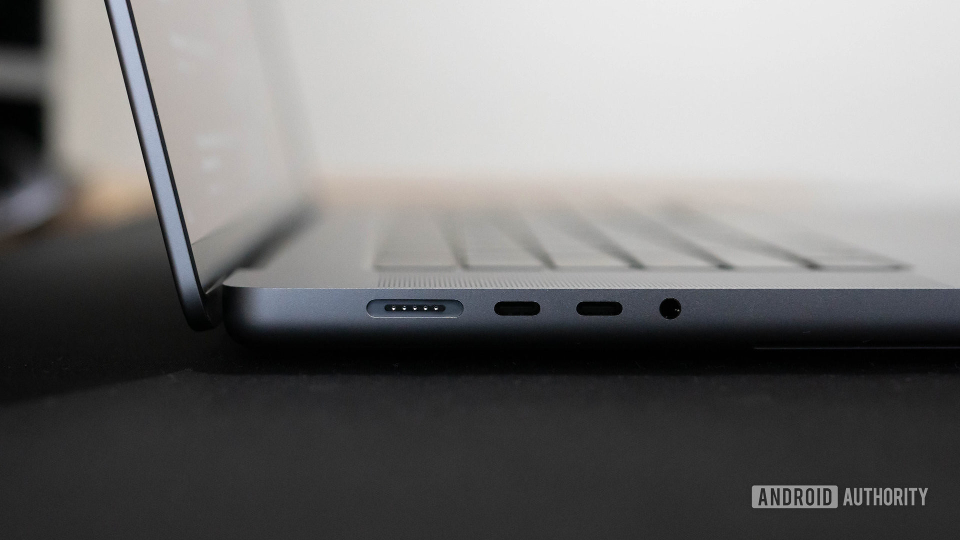 Apple MacBook Pro 2023 left side profile showing MagSafe 3 Thunderbolt 4 USB C ports and 3.5mm headphone port