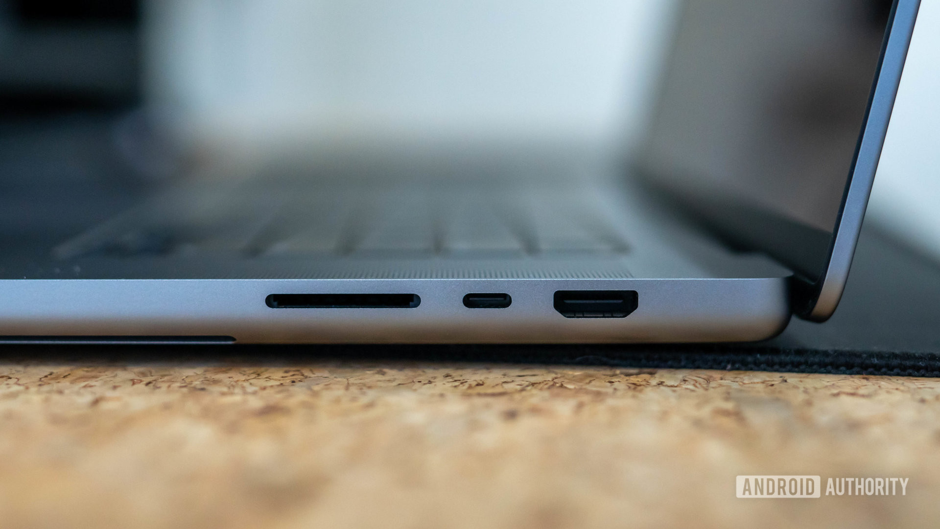 Apple MacBook Pro 2023 right siide profile showing SDXC card slot Thunderbolt 4 USB C port and HDMI 2.1 port