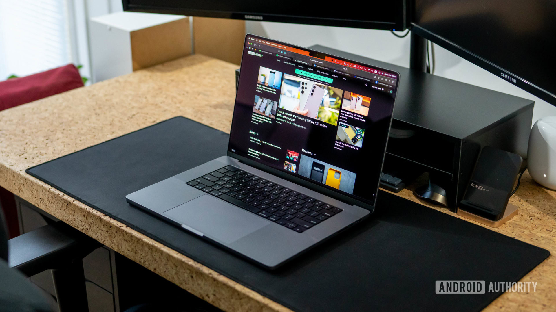 Apple MacBook Pro 2023 sitting on desk with AA site on-screen