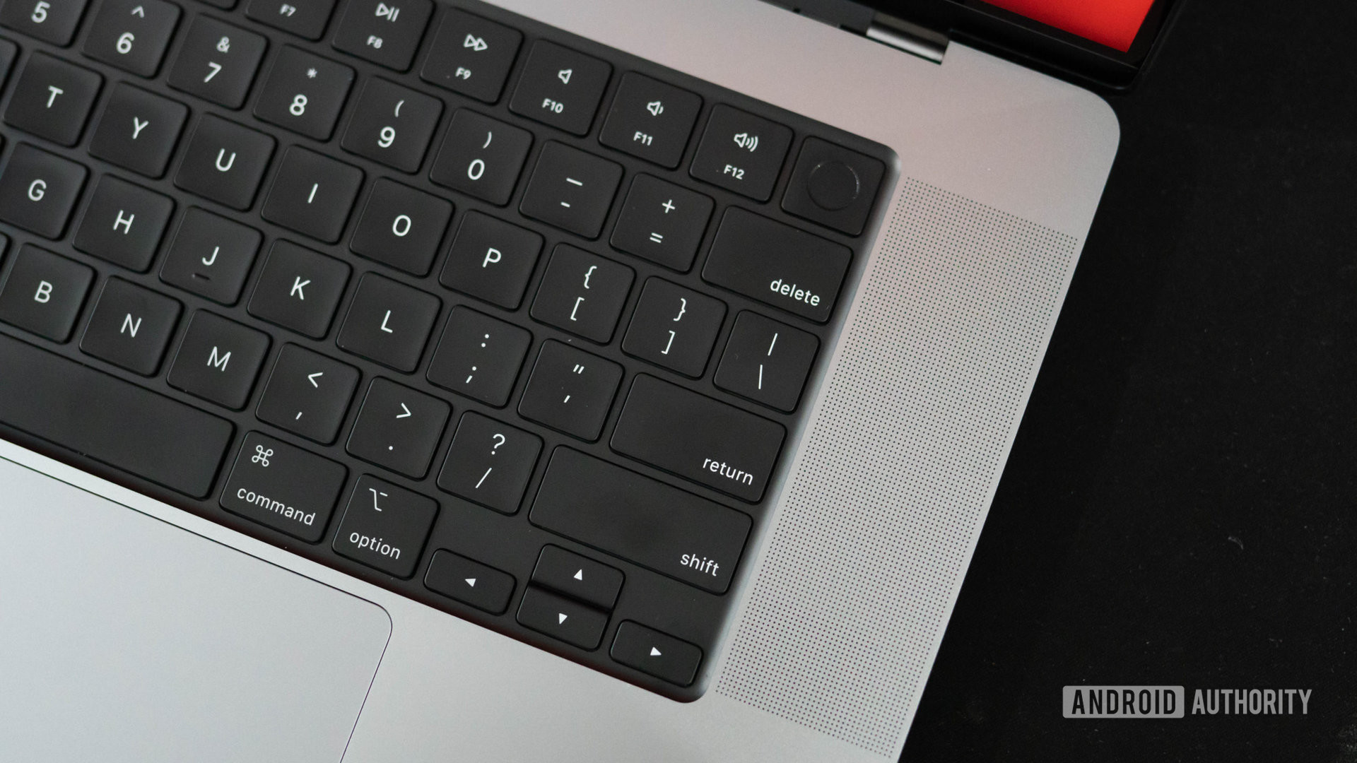 Apple MacBook Pro 2023 speaker grille and keyboard closeup
