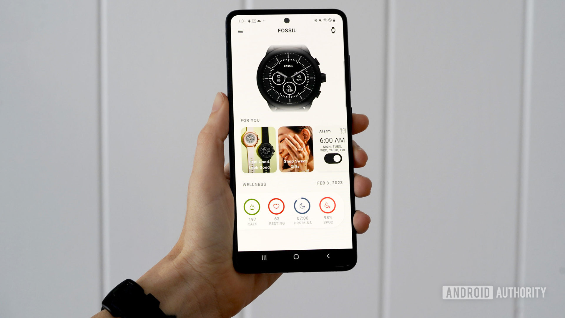 A Samsung Galaxy A51 displays the Fossil Smartwatches App.