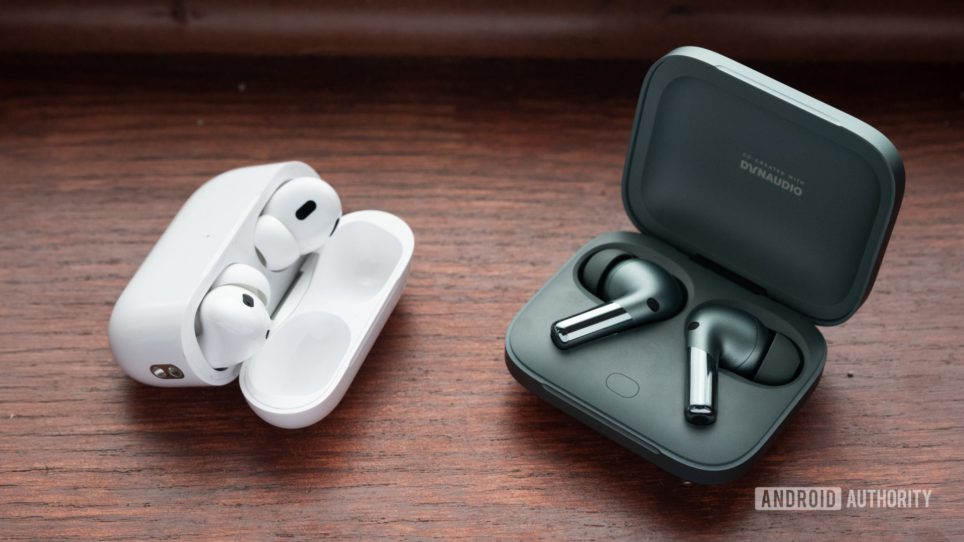 The Apple AirPods Pro (2nd generation) next to the OnePlus Buds Pro 2 wireless earbuds.