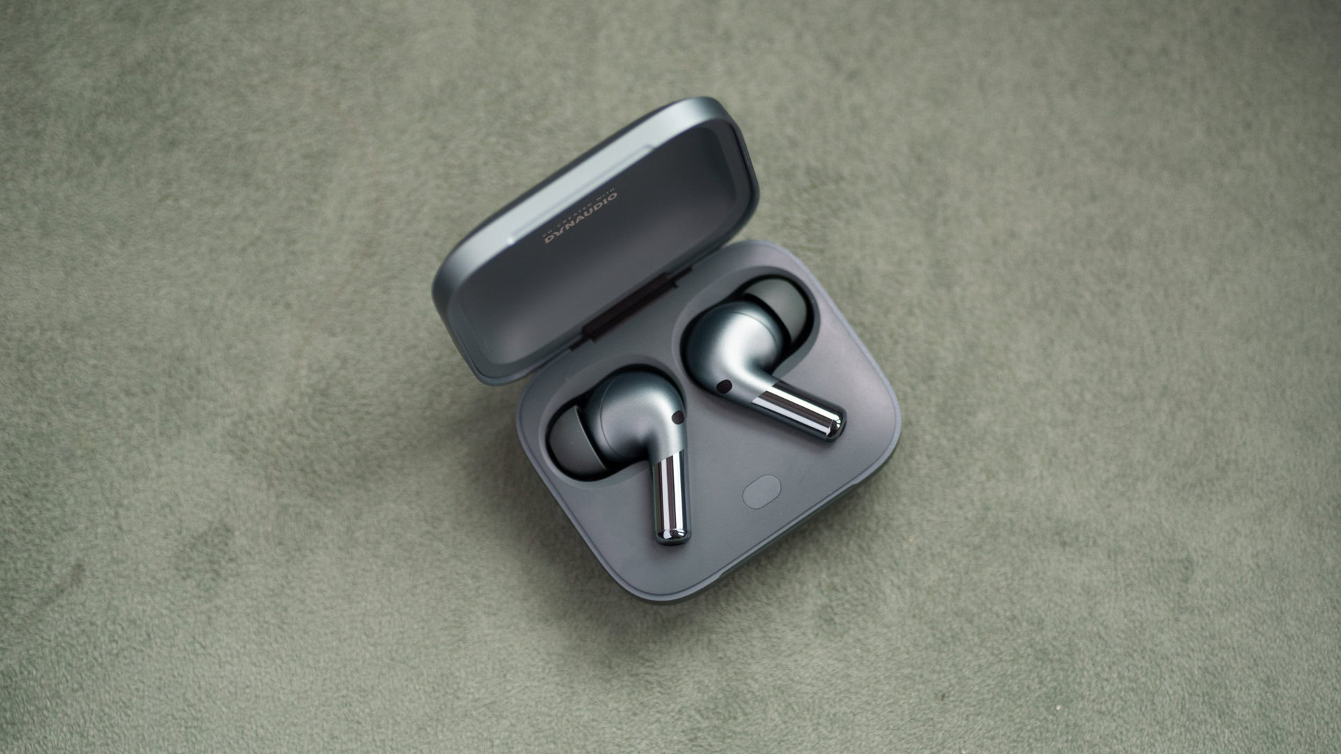 The OnePlus Buds Pro 2 noise cancelling wireless earbuds sit inside the open case.