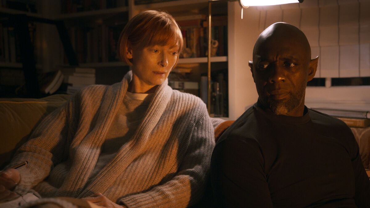 Idris Elba and Tilda Swinton sit together in Three Thousand Years of Solitude - best new streaming movies