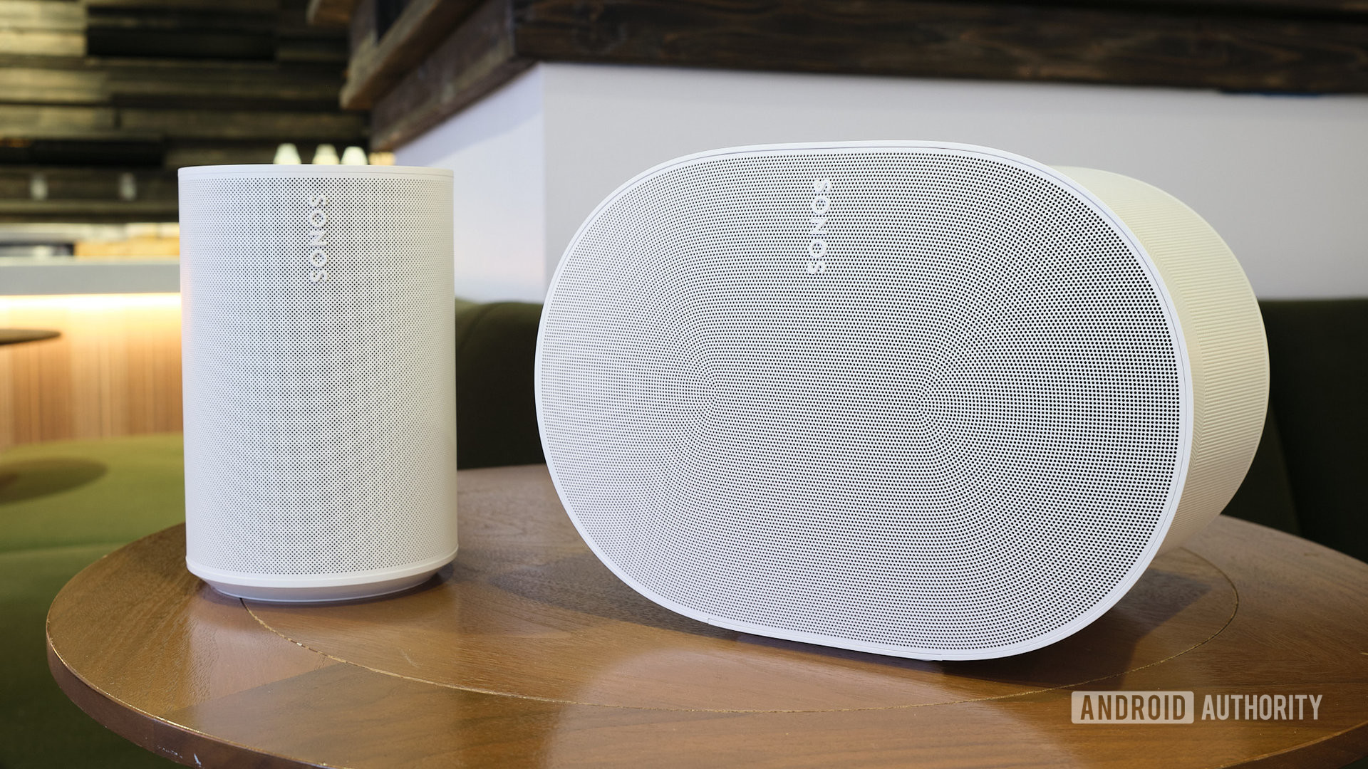 The Sonos Era 300 and Era 100 smart speakers on a table.