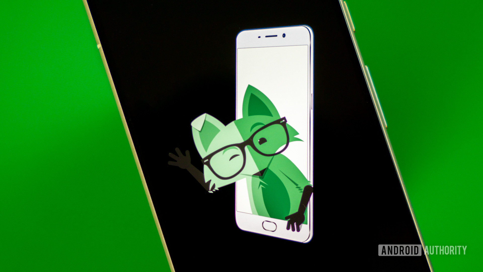 Stock photo of Mint Mobile fox on phone 2