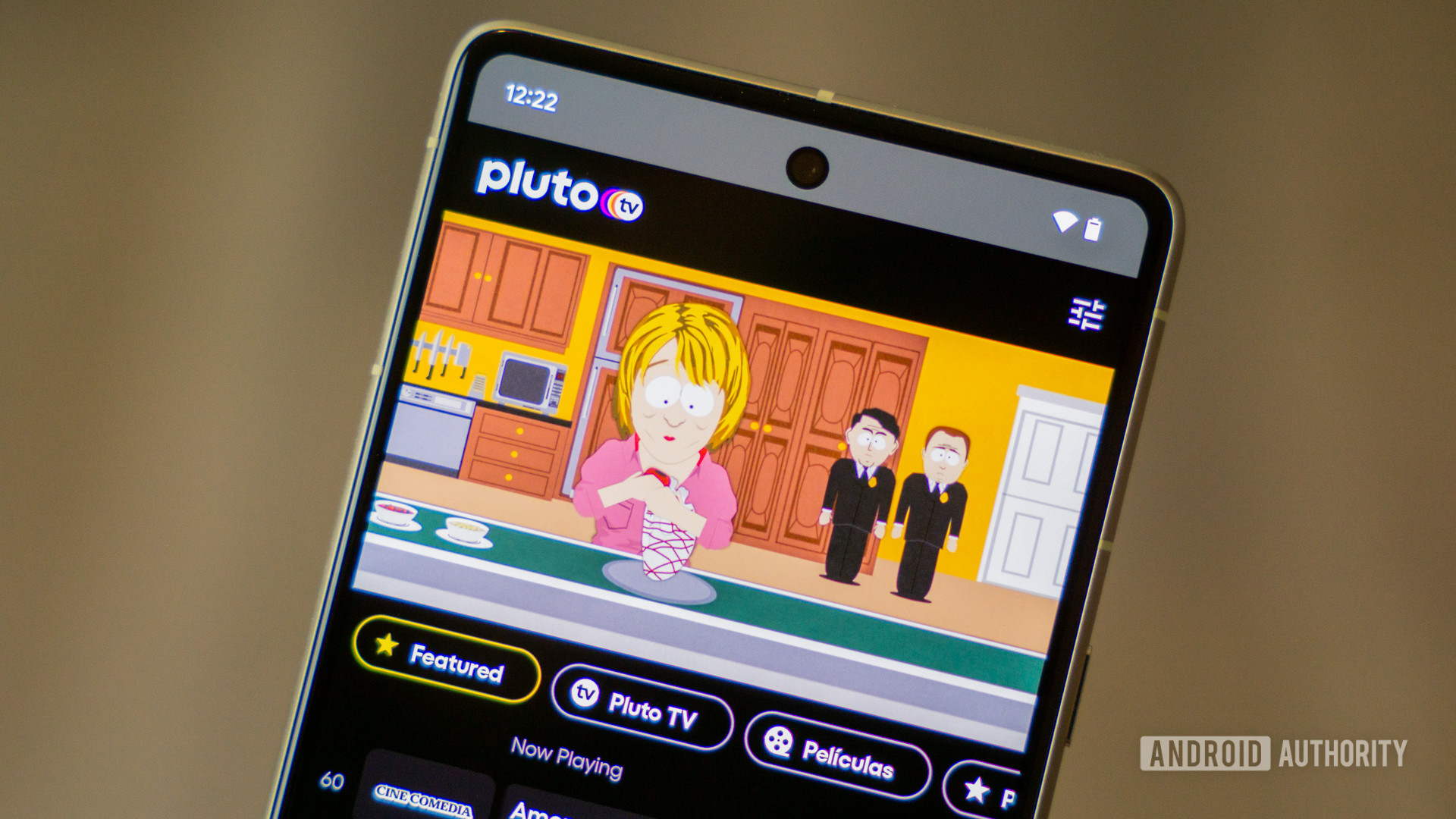 Stock photo of Pluto TV app on phone 1