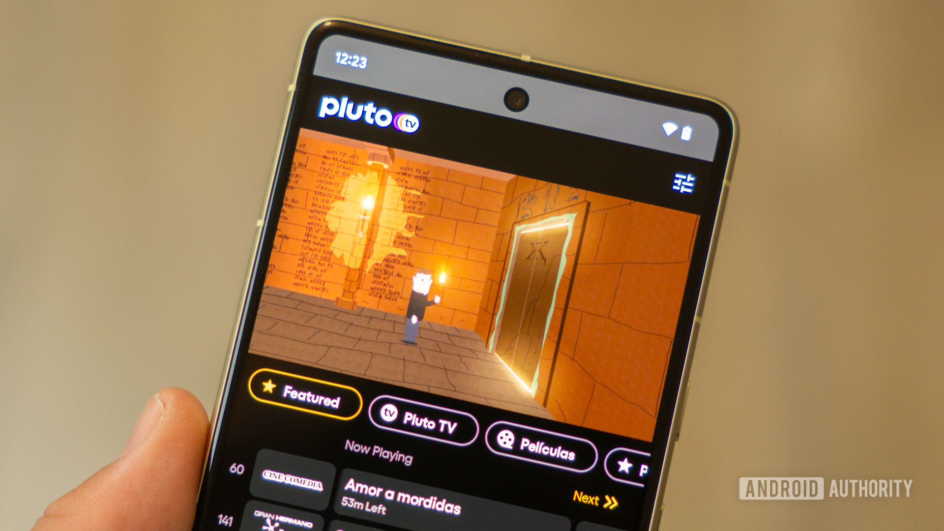 Stock photo of Pluto TV app on phone 2
